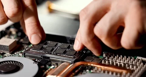 Technician installing ram memory module in laptop. computer upgrade Stock Footage 170432101
