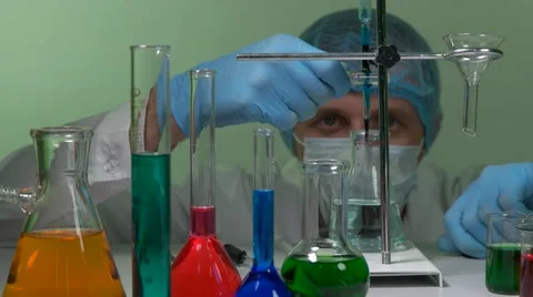 Technician in the laboratory with test tubes Stock Footage 68802565