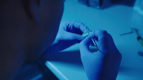 A technician makes teeth in a laboratory Stock Footage 292510633