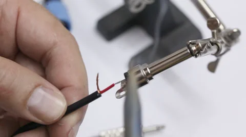 Technician making instrument cable Stock Footage 35884579