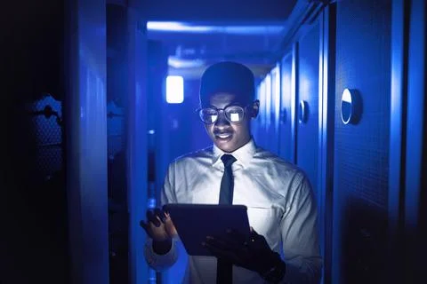 Technician, man and reading tablet in server room for maintenance, software.. Stock Photos