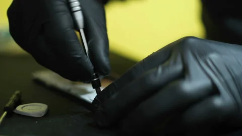 Technician man hands while working on smartphone repair,hi tech device service Stock Footage 148575722