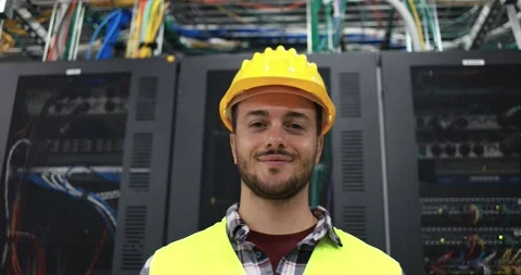 Technician man looking in camera inside server room Stock Footage 149302572