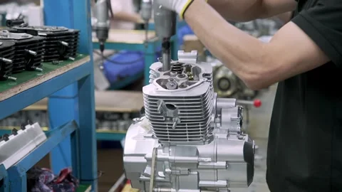 Technician Mounts Cylinder Head On Shiny Motorcycle Engine Component 스톡 동영상 339515035