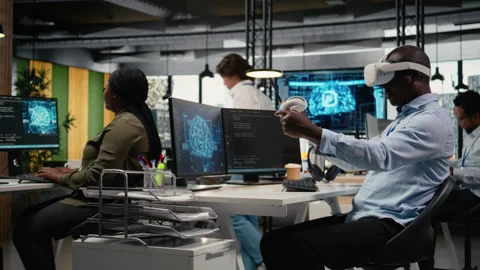 Technician in office using VR headset equipment to accelerate AI calculations Video stock 323238295