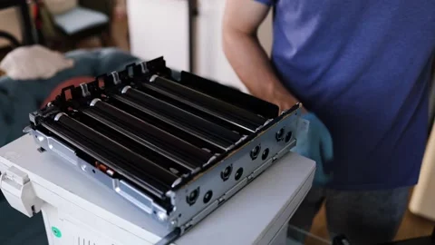 Technician open cover printer fix repair problem and cleaning transfer belt Stock Footage 287504955