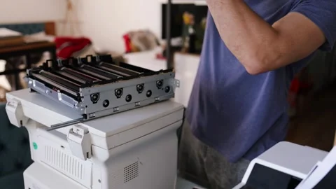 Technician open cover printer fix repair problem and cleaning transfer belt Stock Footage 287504971