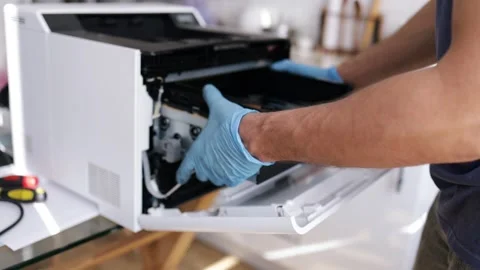 Technician open cover printer fix repair problem and cleaning transfer belt Stock Footage 287505133