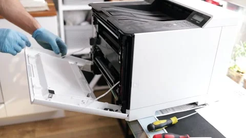Technician open cover printer fix repair problem and cleaning transfer belt Stock Footage 287505201