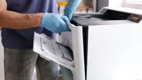 Technician open cover printer fix repair problem and cleaning transfer belt Stock Footage 287505255