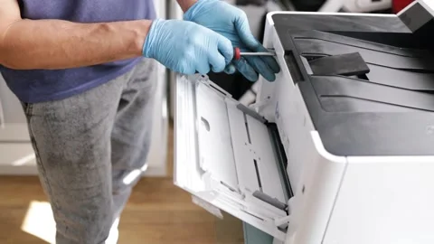 Technician open cover printer fix repair problem and cleaning transfer belt Stock Footage 287505309