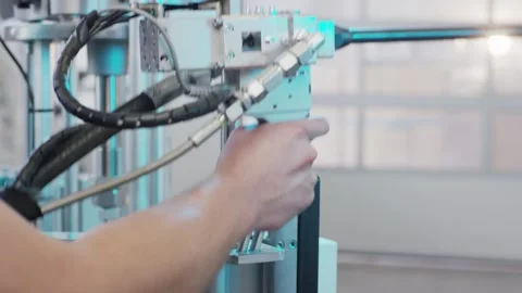 Technician Operating Pneumatic Test Rig, Industrial Engineering Lab, Medium Shot Stock Footage 340358723