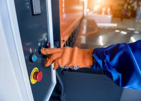 The technician operator use hydraulic bending machine Stock Photos