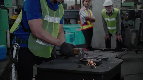 Technician or Construction worker is using electric saw in an industrial factory Video stock 136716949
