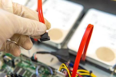 Technician or engineer installs hard drive in cctv, cctv system Stock Photos