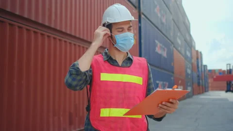 Technician or engineer worker take off hygiene mask and look comfortable Stock Footage 130733711