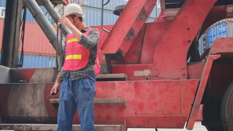 Technician or engineer worker take off hygiene mask and look relax feel fresh Stock Footage 130736677