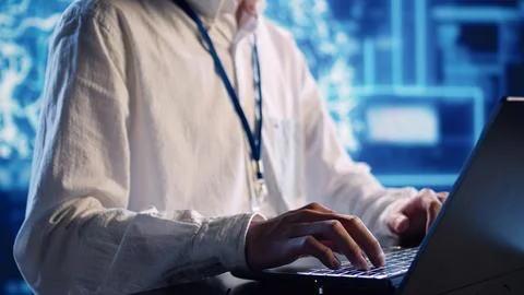 Technician performs AI simulations 写真素材