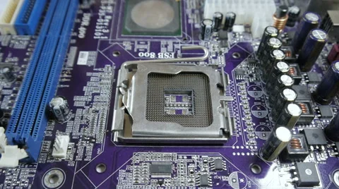 Technician Plug In CPU Microprocessor To Motherboard Socket Video stock 67124874