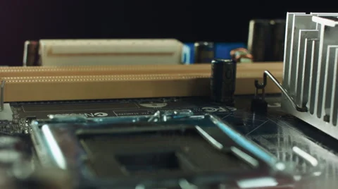 Technician plug in CPU microprocessor to motherboard socket. Workshop background Stock Footage 68954309