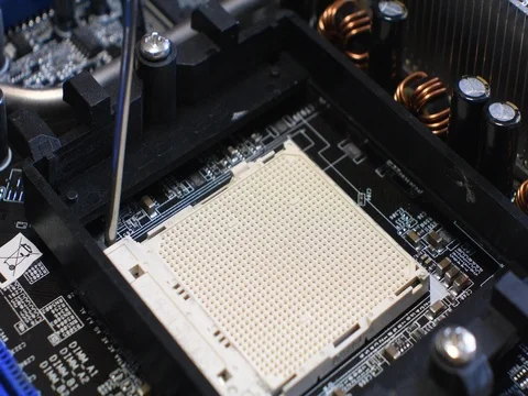 Technician plug in CPU microprocessor to motherboard socket. 4K Stock Footage 80535813