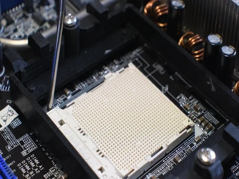 Technician plug in CPU microprocessor to motherboard socket. 4K Stock Footage