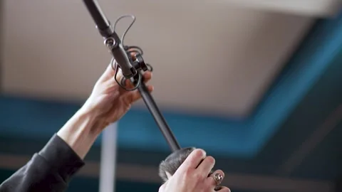 The technician prepares the boom microphone Stock Footage 276259265