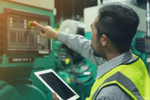 The technician preventive maintenance put button emergency of generator power Stock Photos