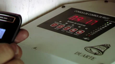 Technician Programming Digital Clock Control Console Inside Clock Tower - 4K Stock Footage 341582309