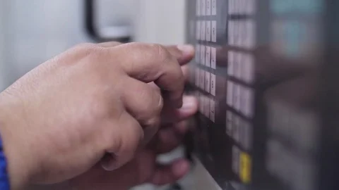 Technician programming with keyboard a  cnc machine slow motion 库存影片 79066742