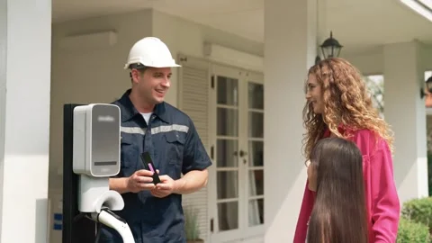Technician provide service support for EV app to customer. Fastidious Stock Footage 261502459