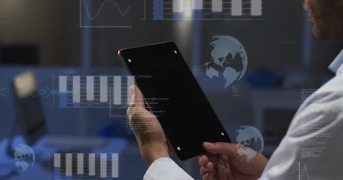 Technician raising tablet in technology lab projecting charts and spinning globe Stock Footage 316191583