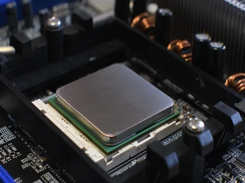Technician remove CPU microprocessor from a motherboard socket. 4K Video stock 80535805