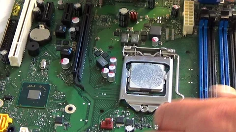 Technician Remove Cpu Microprocessor From A Motherboard Socket Stock-Footage 98545212