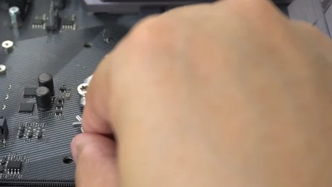 Technician removing And replacing in CPU microprocessor to motherboard socket. Vídeo Stock 128406635