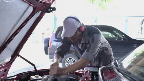 Technician repair engine car Stock-Footage 172181410
