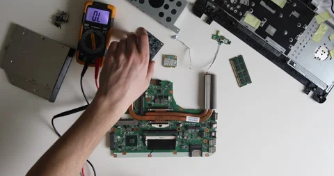 Technician repairing a computer. Work in the service center. Computer repair Stock Footage 153392473