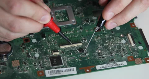 Technician repairing a computer. Work in the service center. Computer repair Stock Footage 153399898