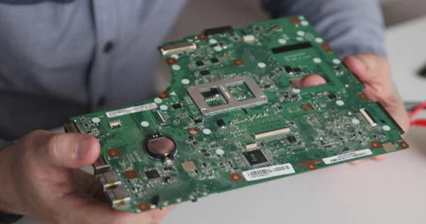 Technician repairing a computer. Work in the service center. Computer repair Stock Footage 153401600