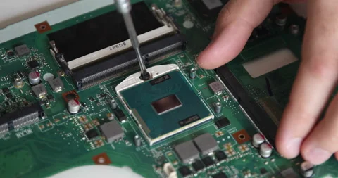 Technician repairing a computer. Work in the service center. Computer repair Stock Footage 153404260