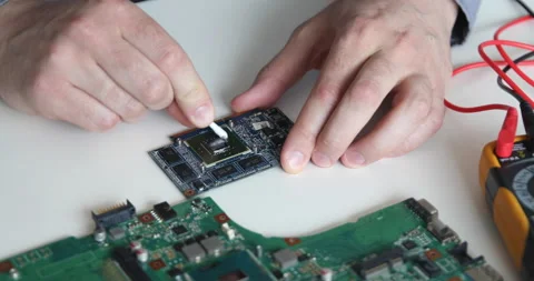 Technician repairing a computer. Work in the service center. Computer repair Video stock 153406554