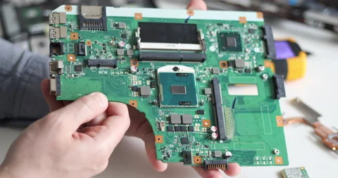 Technician repairing a computer. Work in the service center. Computer repair Stock Footage 153407334