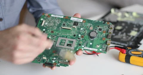 Technician repairing a computer. Work in the service center. Computer repair Stock Footage 153408457