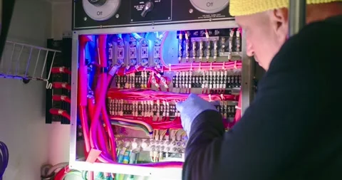 Technician Repairing Electrical Panel in Engine Room 스톡 동영상 323744065