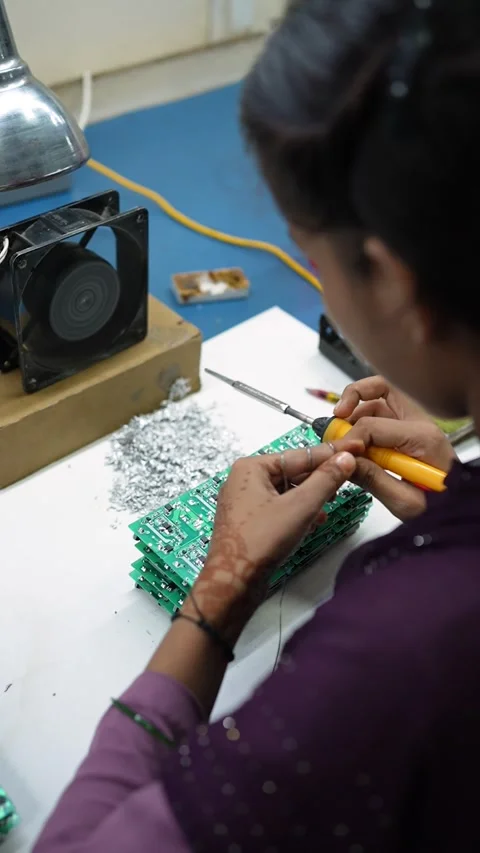 Technician Repairing Electronic Circuit Board in Noida Facility Stock Footage 345809239