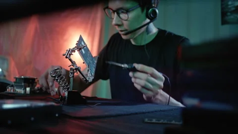 Technician Repairing Electronic Component With Soldering Iron Stock Footage 341661180