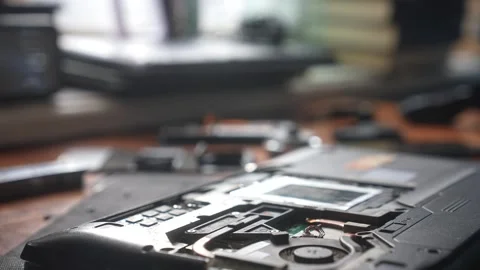 Technician Repairing Laptop with Precision Tools Stock Footage 328861744