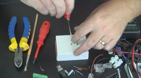 Technician Repairing a Panic Button, Worker on Security System, Electrician Stock Footage 12564010