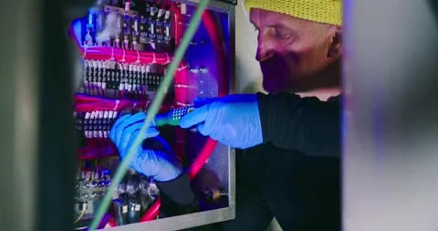 Technician Repairs Electrical Panel in Engine Room 스톡 동영상 323749126