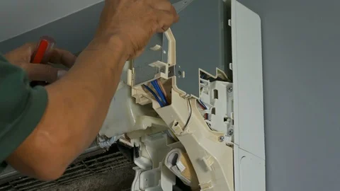 Technician service using electric blowers to dry up and dust cleaning Stock Footage 119881184